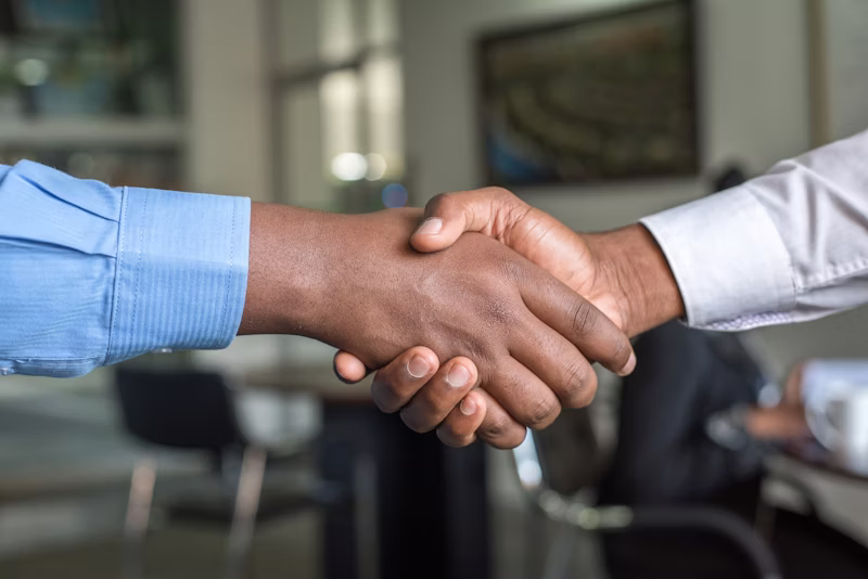 Strategic negotiation handshake